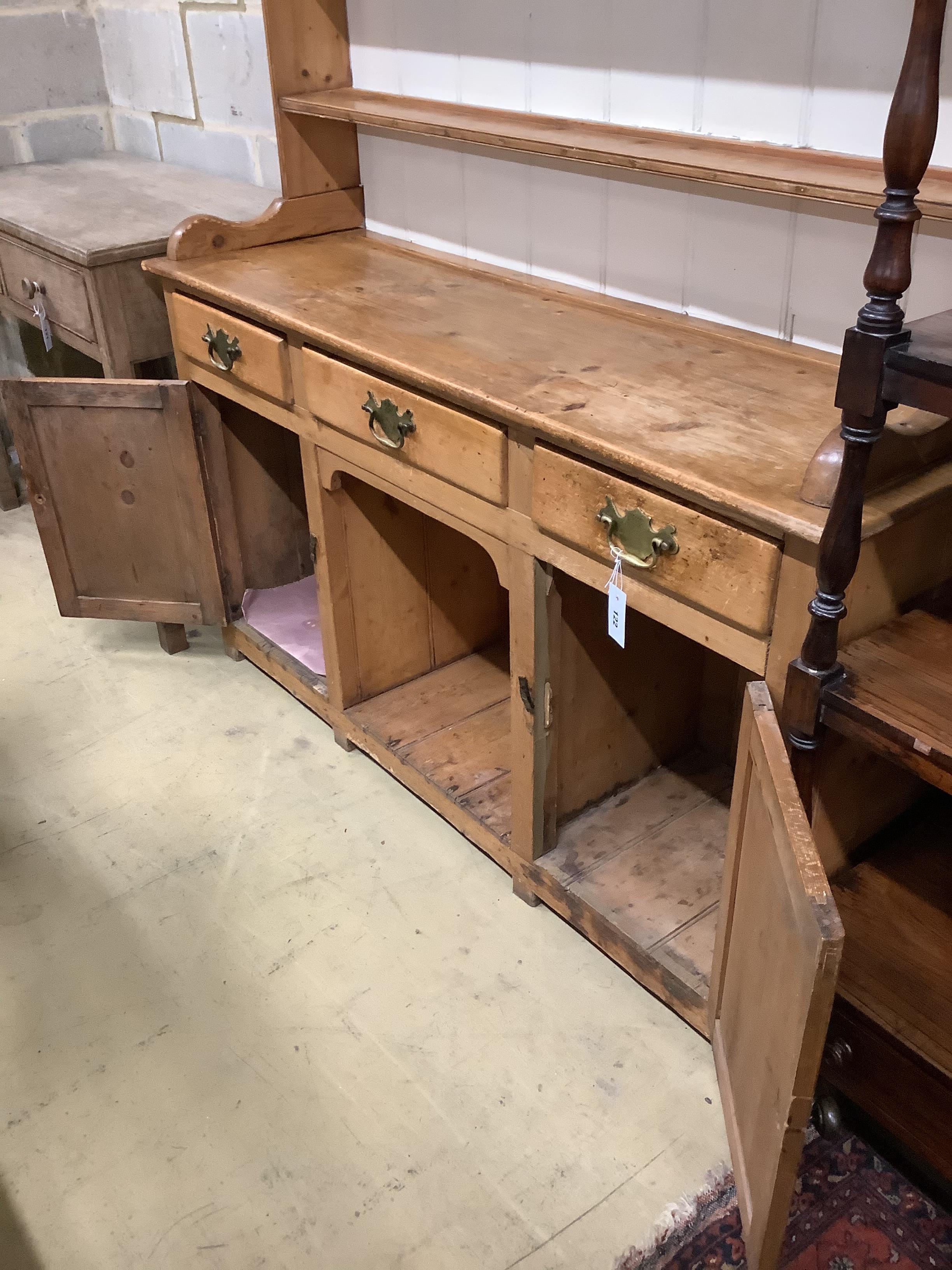 A Victorian pine dresser, length 142cm, depth 44cm, height 205cm